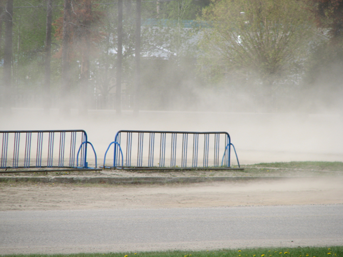 Dusted out: Neighbours protest over school lot dust storms