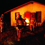 Valemount Volunteer Fire Department working hard to put out the fire on Main St.