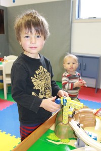 kinnickinnickers boy playing with toy