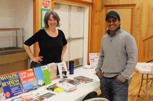 The Small Business Expo happened last week in McBride. Naomi Balla-Boudreau discussing available books with Councillor Raj Basran at the Library display table. Photo: Chris Parker