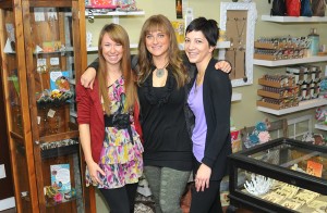 Melanie Chitty, centre, with  some of her staff at Unique Boutique, Caitlin Beddington (left) and Shauna Tremblay Photo submitted by Paul Johnson.