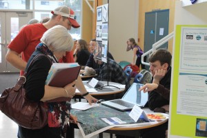 Members of the local adjudication committee for the Columbia Basin Trust’s  Community Initiatives and Affected Areas program as well as members of the public got to check out proposals from local groups on Thursday, before the groups made their presentations. Photo: Korie Marshall