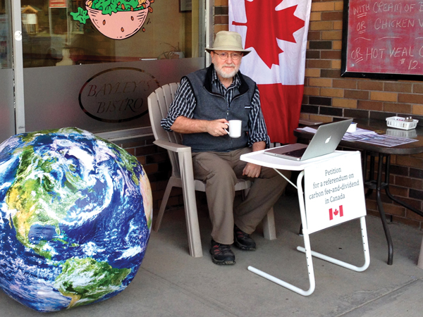 Small town editor pedalling against climate change
