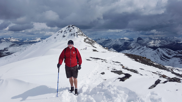 Fred Fox in front of the summit