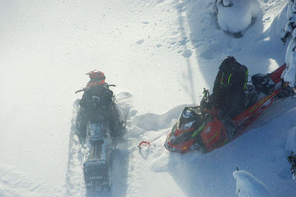 Photo: BC Gov. Snowmobilers caught in a caribou closure area near Blue River.