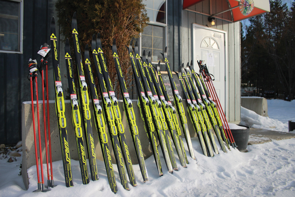 Photo by Korie Marshall  - Thanks to  a Northern Health grant, Kinnickinnickers, and some savvy shopping,  eighteen pairs of youth skis, boots and poles are ready and available to hit the snow.