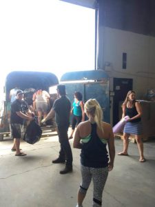 Supplied: Volunteers help to unload Jackilyn Lussier's truckload of help.