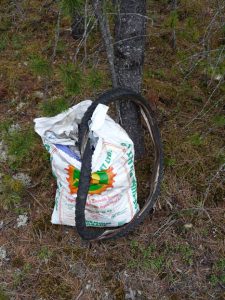 A pellet bag full of carelessly discarded crud is representative of the refuse which builds up on our roadsides and in woodland during the year. / ROSS BALLARD