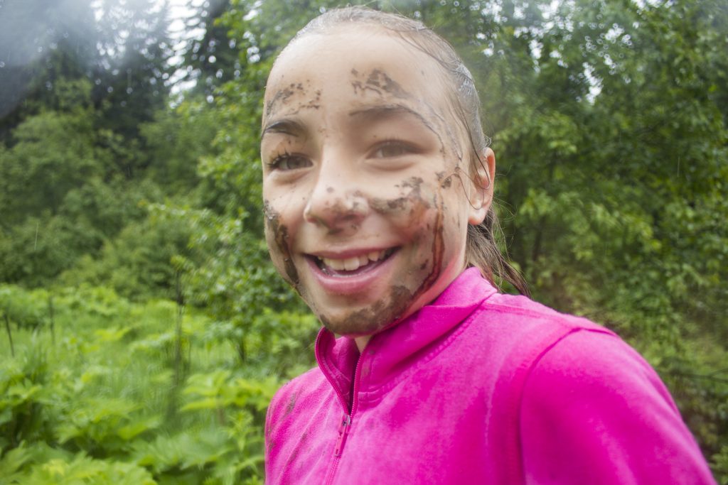 Photo: Evan Matthews Abigail Cinnamon smiles, despite being covered in mud.