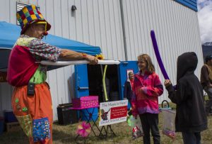 Uncle Chris the Clown entertains local kids at the Sports Grounds last weekend.
