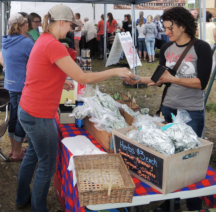 Photo: Beth Russell Christine Pelletier with her herbs and flowers