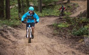 Photo: Evan Matthews Riders of varying skill ride to the bottom of Bacon Trail, seen here. Curtis Pawliuk says the trail needs your help to be packed down, and the best way to do that is to ride.