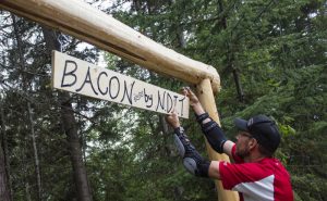 Photo: Evan Matthews Randy Pruden erects the trail’s new sign.