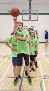 Ben Dempsey puts focuses into this shot at the free throw line. Sure enough, “swish,” nothing but net.