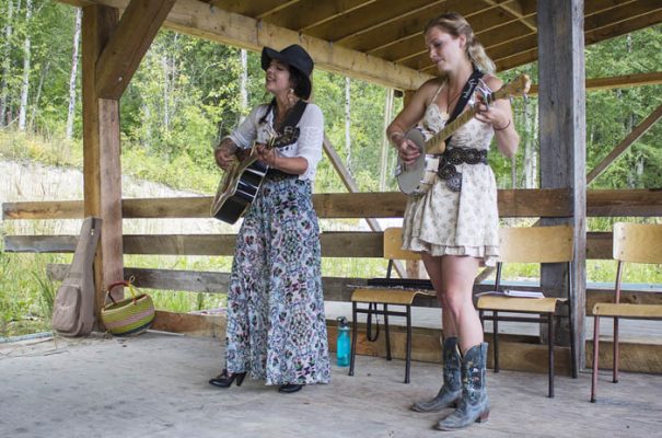 Photo: Evan Matthews Raven Moon (left) and Carolyn Kirk (right) play the RVMF's Earthship stage on Sunday afternoon.