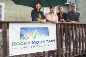 Photo: Evan Matthews (Left to right) Naho Kikuchi, 26, and Mayumi Murata, 31, from Tokyo, Japan, along with Nancy Ramirez, 28, from Mexico, stand with their teacher, Jared Smith.