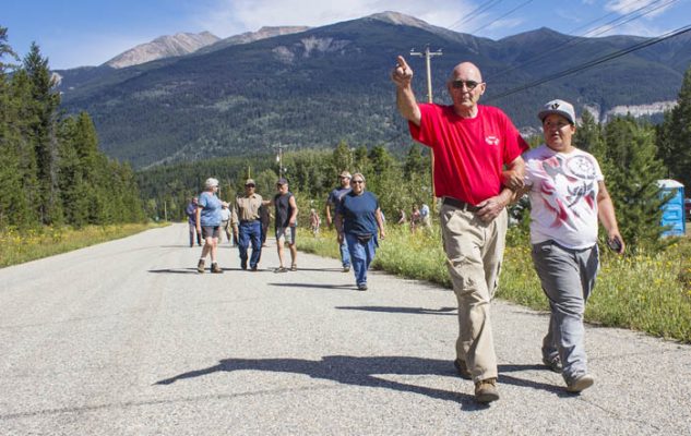 Photo: Evan Matthews Ian Cameron points to the area his ancestors walked, while he and his daughter Adele are arm-in-arm.