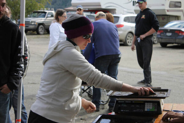 Jen Friesen weighs in her catch at the marina
