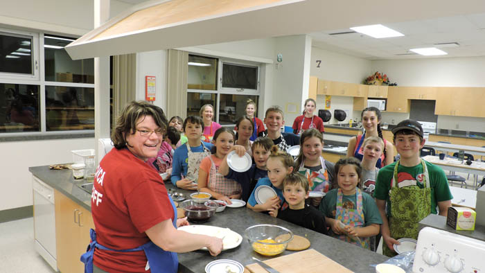 Photo: Alicia Hill Kinnikinnickers put on a cooking class for nine- to 12-year-old kids, which was held at the secondary school. Roxie Smid taught the class. Many of the kids expressed how much they enjoyed the class, and all that they learned. Smid says they will be putting together another class for January.