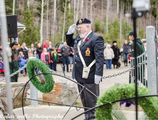 Photo: Bob Hoskins Pete Pearson, leader of Valemount’s Legion (266), stands at attention during the Nov. 11 Remembrance Day service. Pearson attended VSS’ service a day earlier.