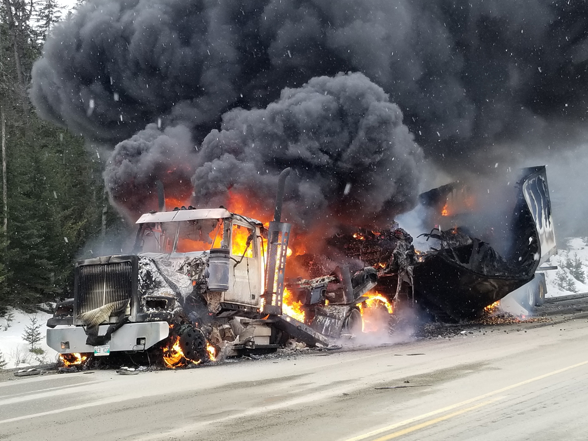 Driver escapes uninjured in truck fire +VIDEO