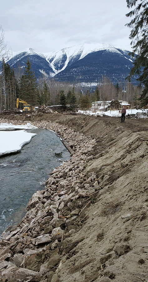 Eroding Dore River bank gets rip rap