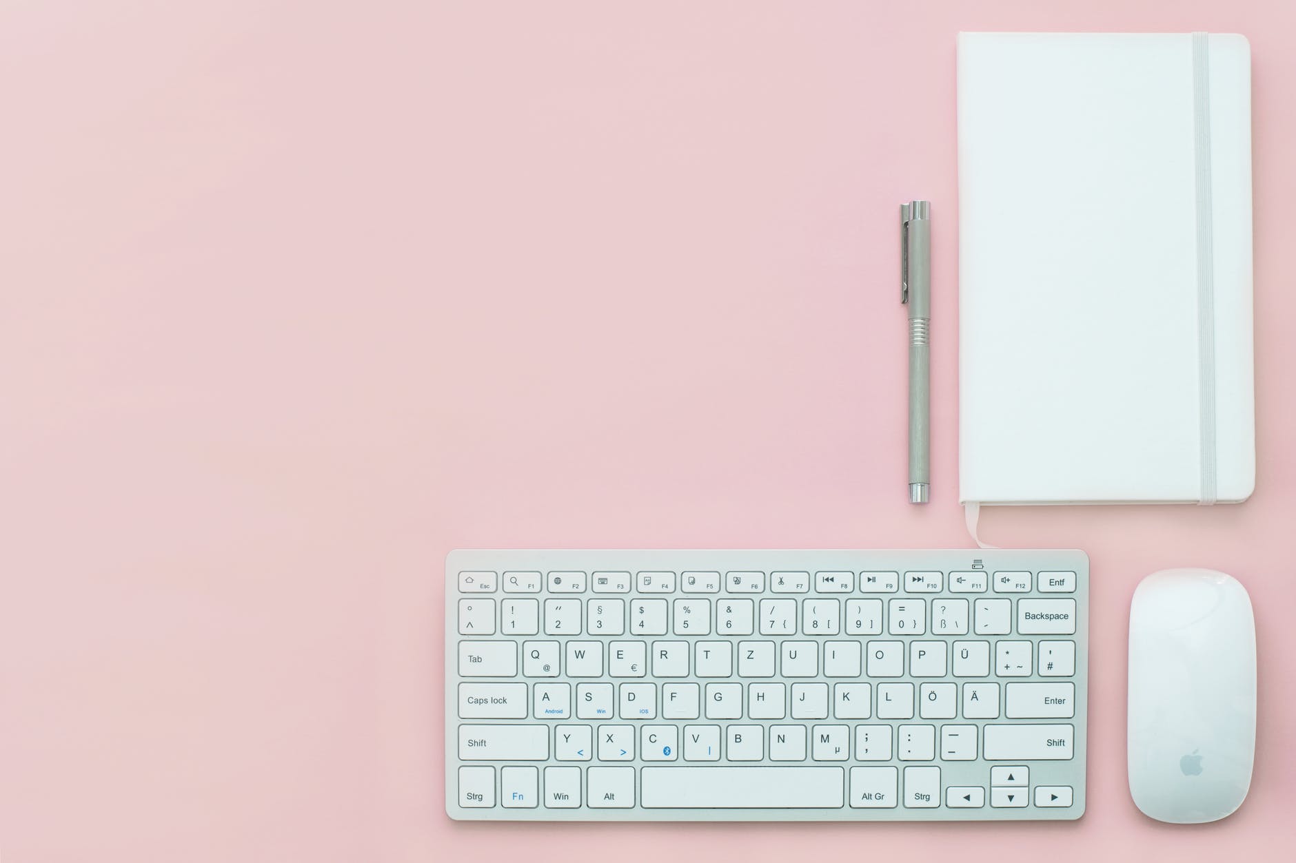 silver apple keyboard and magic mouse