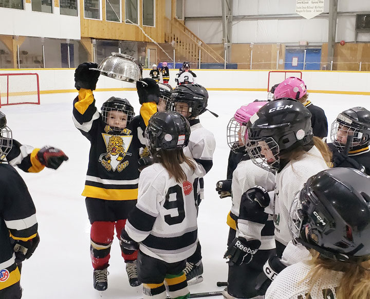 Tykes hoist the cup as hockey season wraps up