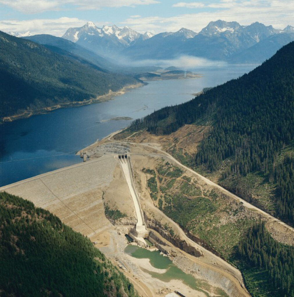 The Mica dam is one of the
tallest earthfill dams in the
world. Prior to the treaty, the
Canoe Valley river bottom had
been a rich source of lumber
and enjoyed by residents for
things like trapping, berry
picking, and soaking in the
year-round hot springs. /
COURTESY COLUMBIA
BASIN TRUST