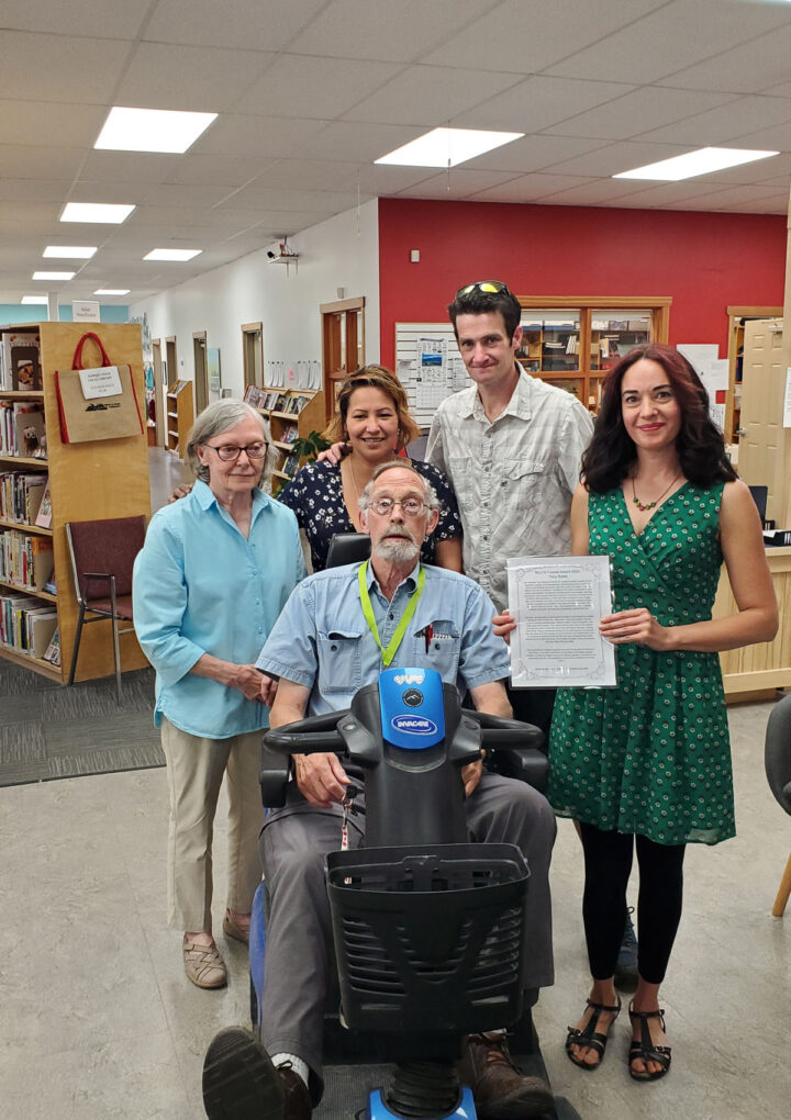 Local volunteer honoured for commitment to library